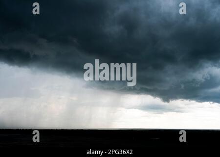 Background of dark clouds before a thunder-storm in the evening Stock Photo