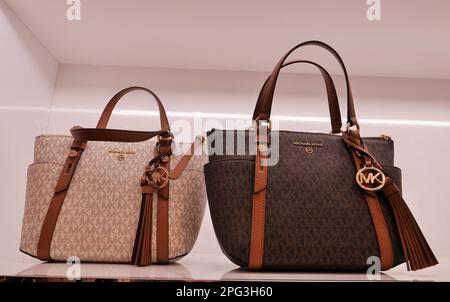 MICHAEL KORS BAGS FOR WOMEN INSIDE THE FASHION STORE Stock Photo