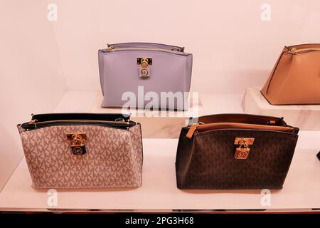 MICHAEL KORS BAGS FOR WOMEN INSIDE THE FASHION STORE Stock Photo