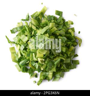 pile of chopped leek leaves, edible lighter green leafy vegetable ready for cooking isolated on white background, taken straight from above Stock Photo