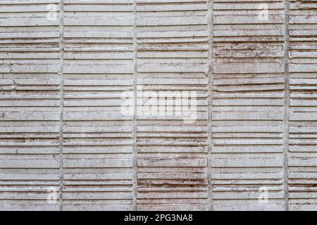 Abstract weathered texture stained old stucco light gray and aged paint white brick wall background. Brick wall may used as background. Stock Photo
