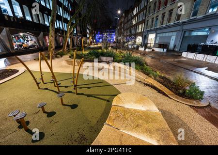 Flower borders, seating and play facilities fill Alfred Place in ...