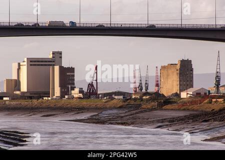 Bristol, England, UK - March 10, 2007: Traffic crosses the Avonmouth Bridge on the M5 motorway, high above the muddy estuary of the River Avon, with t Stock Photo