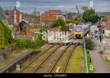 Greater Anglia train approaching the station at Woodbridge in Suffolk Stock Photo