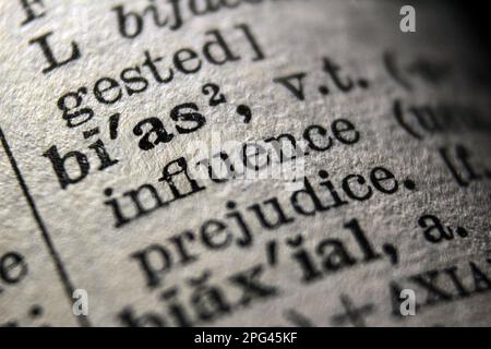 Definition of word bias on dictionary page, close-up Stock Photo