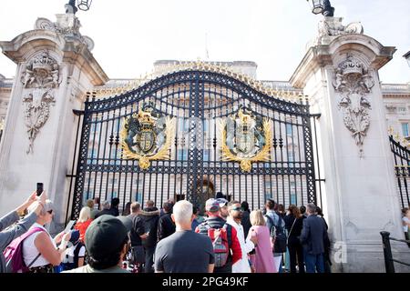 People walk around Buckingham Palace in London on the first Saturday since the state funeral of Queen Elizabeth II. Stock Photo