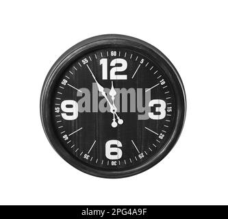 Clock showing five minutes until midnight on white background. New Year countdown Stock Photo