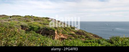 Dana Point Headlands Conservation Area landscape and with sailboats and yachts in in the Pacific Ocean in southern California Stock Photo