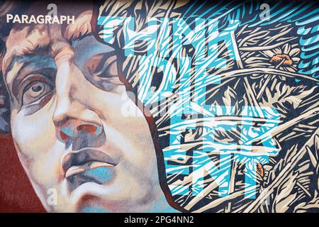 Ivano-Frankivsk, Ukraine - March, 2023: Think different, graffiti on street. Stock Photo