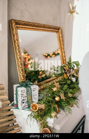 A vertical shot of interior detail in festive Christmas decorations Stock Photo