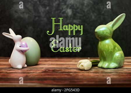 Happy Easter. Congratulatory easter background. Easter bunnys egg and flower Stock Photo