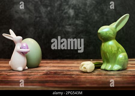 Happy Easter. Congratulatory easter background. Easter bunnys egg and flower Stock Photo
