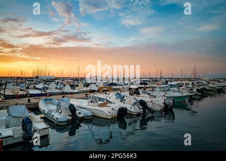 Port with moored yachts and boats. Stock Photo