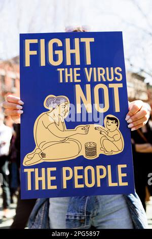"Fight the virus not the people" Sign at Anti-Asian Violence Rally, New York City, New York, USA Stock Photo