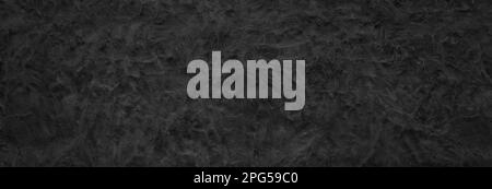 aesthetic black plaster or stucco panoramic background Stock Photo