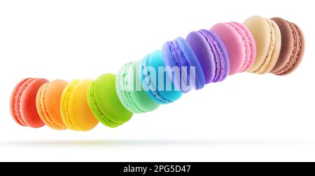 Macaroons of various flavours in long line over white background, levitation panorama Stock Photo