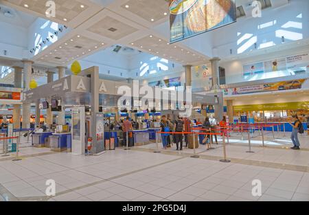 BARI, ITALY - September 26, 2019 People are waiting in the check-in lines at the Karol Wojtyla International Airport. Stock Photo