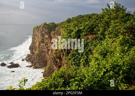 Shoreline near Uluwatu Temple, South Bali, Indonesia Stock Photo