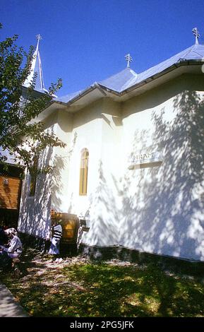 Posaga, Alba County, Romania, 1999. Exterior view of the Christian Orthodox church 'Archangels St. Michael and Gabriel'. Stock Photo