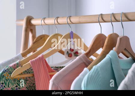 Scented sachet with flowers and stylish clothes on hanger Stock Photo -  Alamy