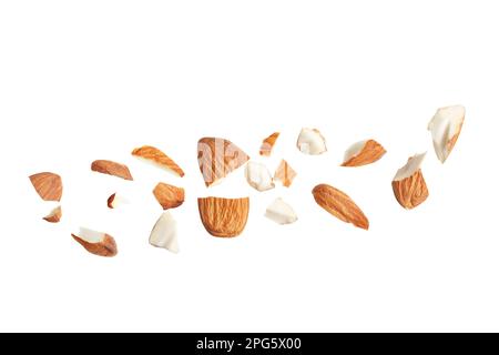 Pieces of tasty almonds on white background Stock Photo