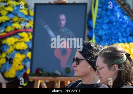 Kyiv, Ukraine. 20th Mar, 2023. Relatives mourn near the portrait of Bizhan Sharopov, Ukrainian serviceman and widely known biologist during his funeral ceremony at the Independence Square in Kyiv. Credit: SOPA Images Limited/Ģ����ý Live News Stock Photo