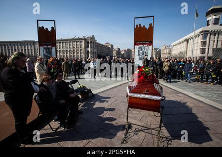 Kyiv, Ukraine. 20th Mar, 2023. Relatives mourn at the coffin with the body of Bizhan Sharopov, Ukrainian serviceman and widely known biologist during his funeral ceremony at the Independence Square in Kyiv. Credit: SOPA Images Limited/Ģ����ý Live News Stock Photo