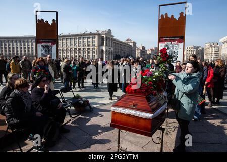 Kyiv, Ukraine. 20th Mar, 2023. Relatives mourn at the coffin with the body of Bizhan Sharopov, Ukrainian serviceman and widely known biologist during his funeral ceremony at the Independence Square in Kyiv. (Photo by James McGill/SOPA Images/Sipa USA) Credit: Sipa USA/Ģ����ý Live News Stock Photo