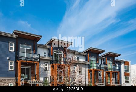 New residential townhouses. Modern apartment buildings in Canada. Modern complex of apartment buildings. Concept of real estate development, house for Stock Photo