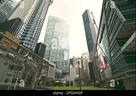 Center square of Raffles Place, the financial heart of Singapore, surrounded by commercial buildings and headquarters of major banking institutions Stock Photo