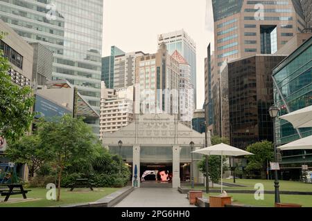 Entrance to MRT (Mass Rapid Transit) station in the center of Raffles Place, the financial heart of Singapore Stock Photo