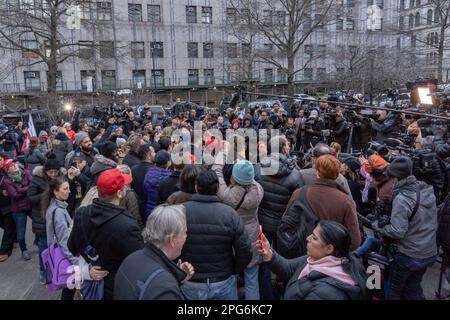 New York, United States. 20th Mar, 2023. People gather for a rally, outside the court house, in support of former President Donald Trump amid his complex legal situation, which he has suggested could lead to his arrest on Tuesday on March 20, 2023 in New York City. Credit: SOPA Images Limited/Alamy Live News Stock Photo