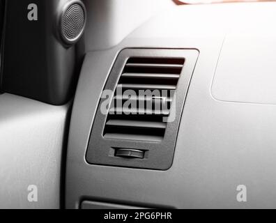 The air vent with a dial to adjust the wind power and direction of the car on the dashboard, Automotive parts concept Stock Photo
