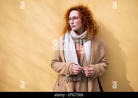 Curly redhead woman outdoor in the countryside, candid portrait Stock ...