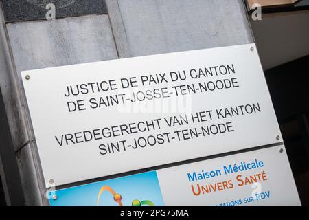 Illustration picture shows the sign on the building of the justice of the peace during a protest ahead of a session of the justice of the peace in Sint-Joost-ten-Node - Saint-Josse-ten-Noode, Brussels, regarding the occupation of the future National Crisis Center, in Brussels, Tuesday 21 March 2023. Some seventy asylum seekers, supported by solidarity citizens, have occupied the future National Crisis Center since 13 March. The occupation action aims to offer an emergency solution and to force the government to respect its obligations. The case will be heard at the peace court on Tuesday 21 Ma Stock Photo