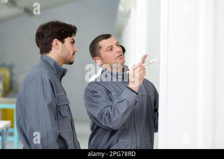 portrait of painter with apprentice Stock Photo