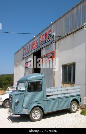 citroen hy in front of french garage Stock Photo