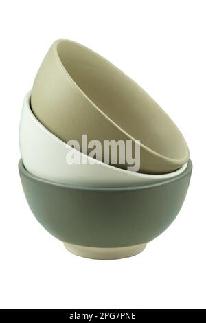 Porcelain bowls isolated on a white background. Gray, beige, graphite bowls. Vertical photo. Stock Photo