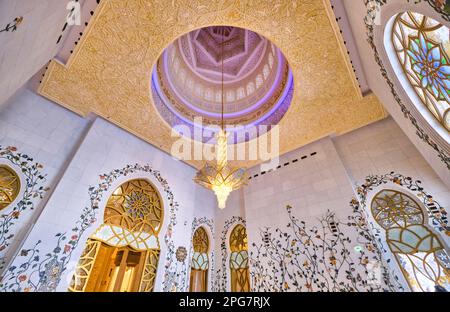 Detail view of interior of a blue dome with gold chandelier. At the Sheikh Zayed Grand Mosque in Abu Dhabi, UAE, United Arab Emirates. Stock Photo
