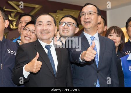 New Taipei City Mayor Hou You-yi, second from right, cheers with party ...