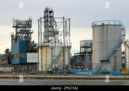 Refinery installation and tanks in the Botlek harbor at the port of Rotterdam in the Netherlands Stock Photo