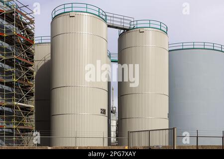 Refinery installation and tanks in the Botlek harbor at the port of Rotterdam in the Netherlands Stock Photo