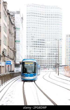 BIRMINGHAM, UK - MARCH 9, 2023.  West Midlands Tram in Birmingham city centre during travel disruption caused by heavy snow Stock Photo