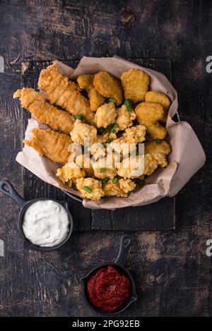 Chicken nuggets, strips and bites Stock Photo