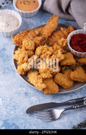 Chicken nuggets, strips and bites Stock Photo