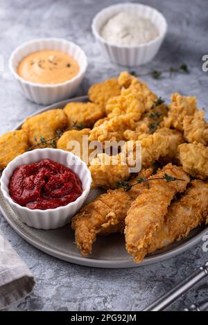 Chicken nuggets, strips and bites Stock Photo