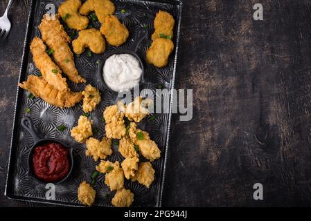 Chicken nuggets, strips and bites Stock Photo