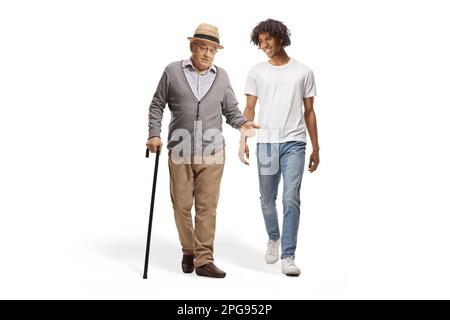 Full length portrait of an african american guy smiling and walking together with an elderly man isolated on white background Stock Photo