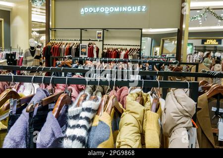 Mexico City,Polanco,El Palacio de Hierro,luxury department store,women's designer clothing rack racks Adolfo Dominguez,inside interior indoors,store s Stock Photo
