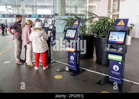 Mexico City,Aeropuerto Internacional Benito Juarez International Airport,terminal self-serve service kiosk touchscreen check-in,passengers travelers,m Stock Photo